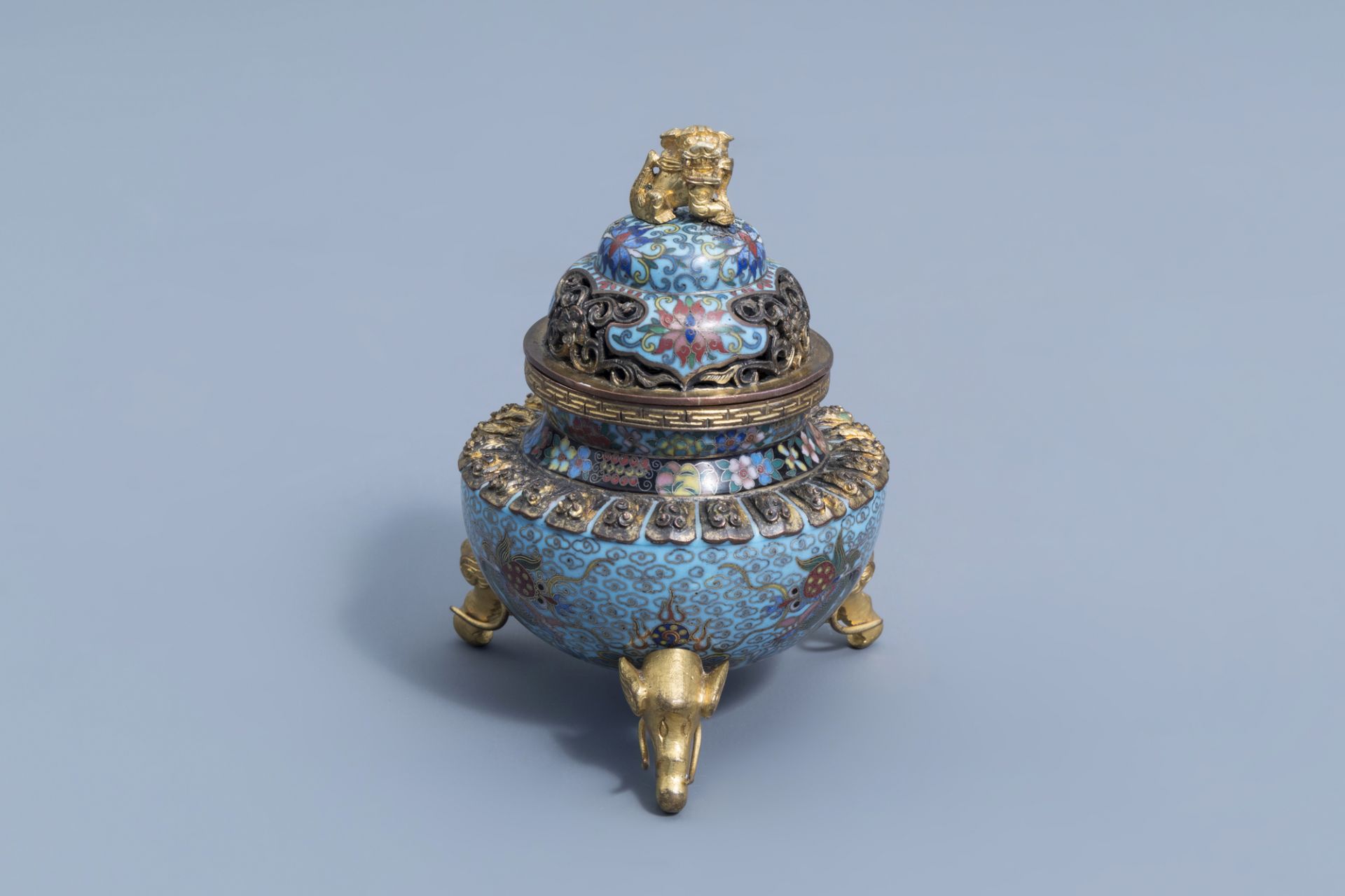 A Chinese cloisonne tripod 'dragons chasing the pearl' incense burner and cover, 20th C.