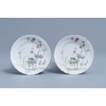 A pair of Chinese famille rose saucers with a grasshopper among blossoming branches, Daoguang mark a