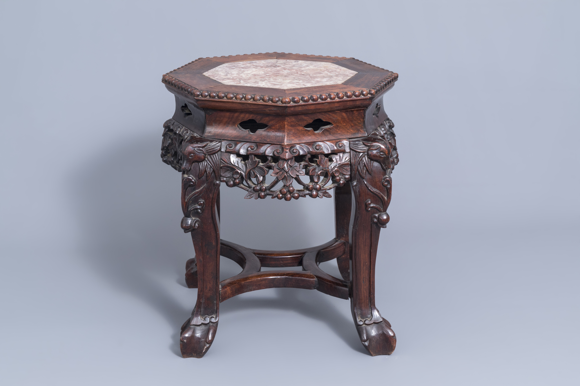 A collection of Chinese wooden stands and a carved wooden stand with marble top, 19th/20th C. - Image 12 of 14