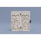 A French Gothic Revival carved ivory diptych depicting the Adoration of Christ and Mary Queen of Hea