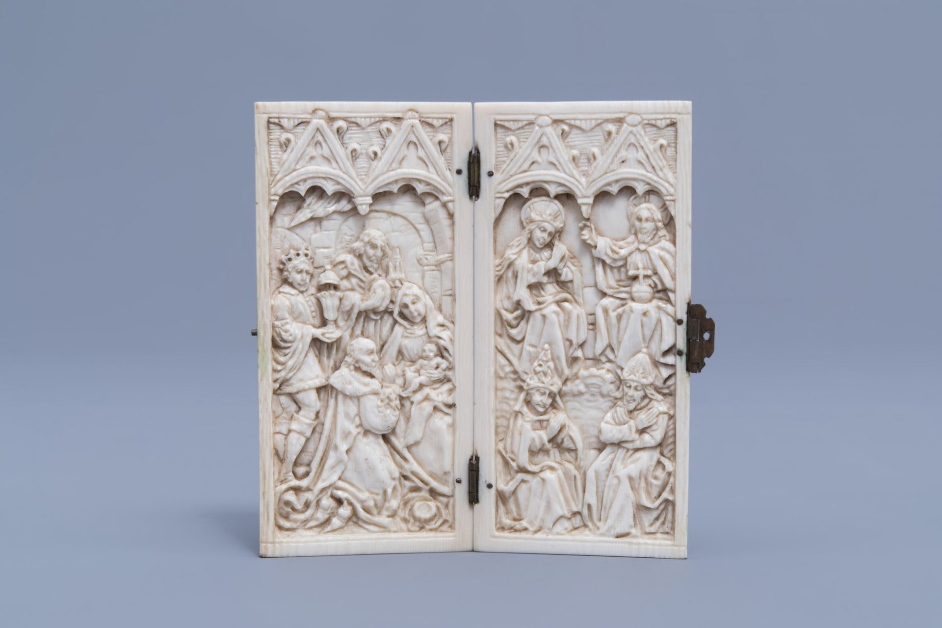 A French Gothic Revival carved ivory diptych depicting the Adoration of Christ and Mary Queen of Hea