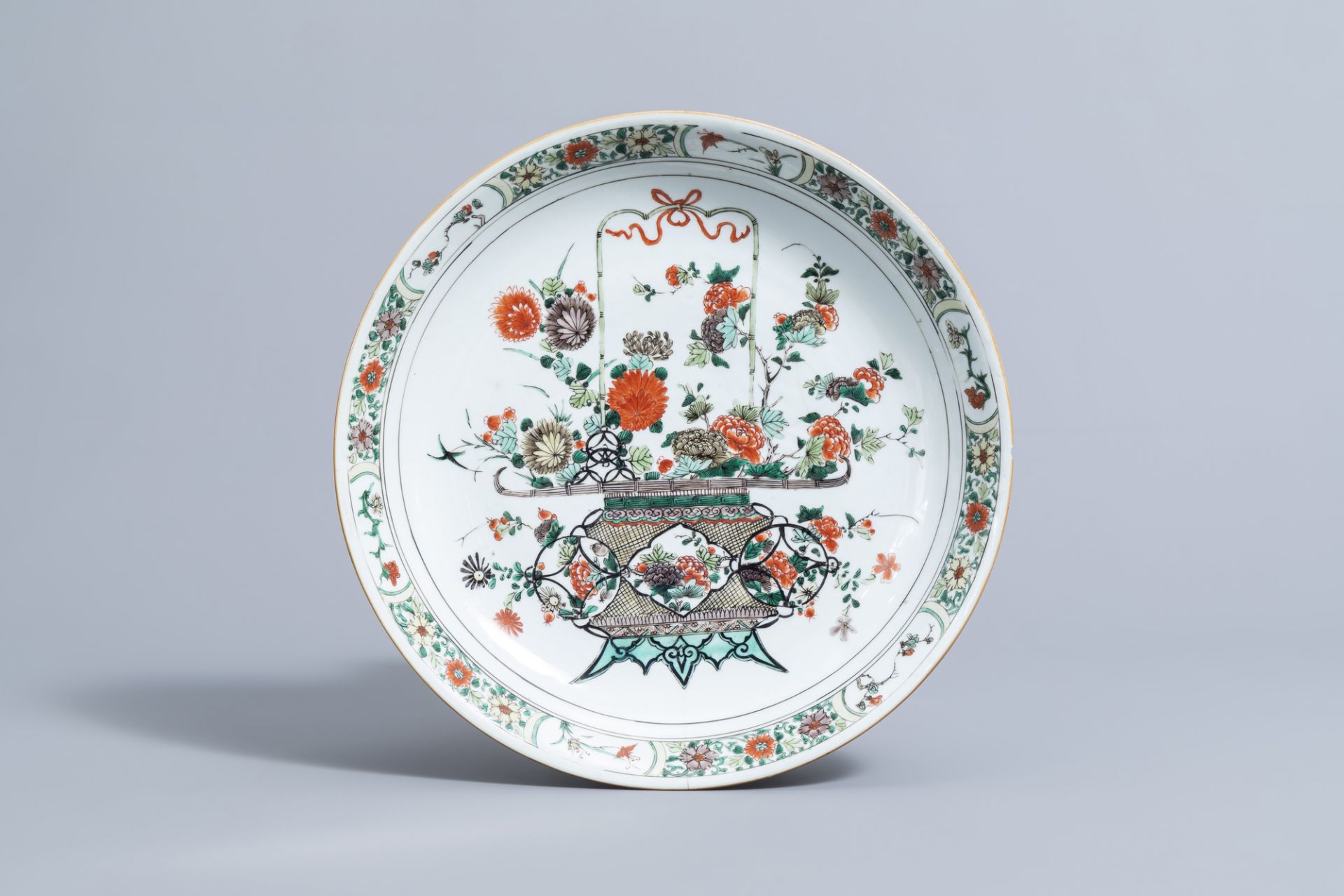 A Chinese famille verte 'flower basket' charger, Kangxi