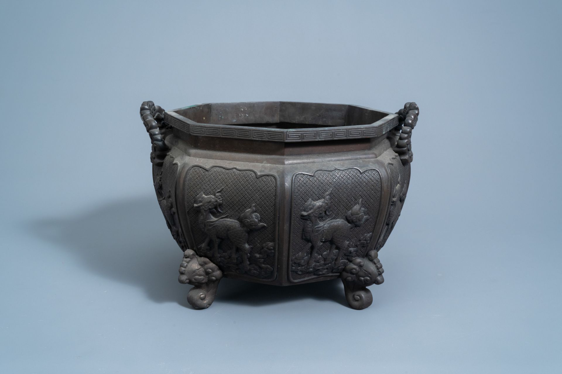 A Japanese octagonal bronze jardiniere, Meiji, 19th C.