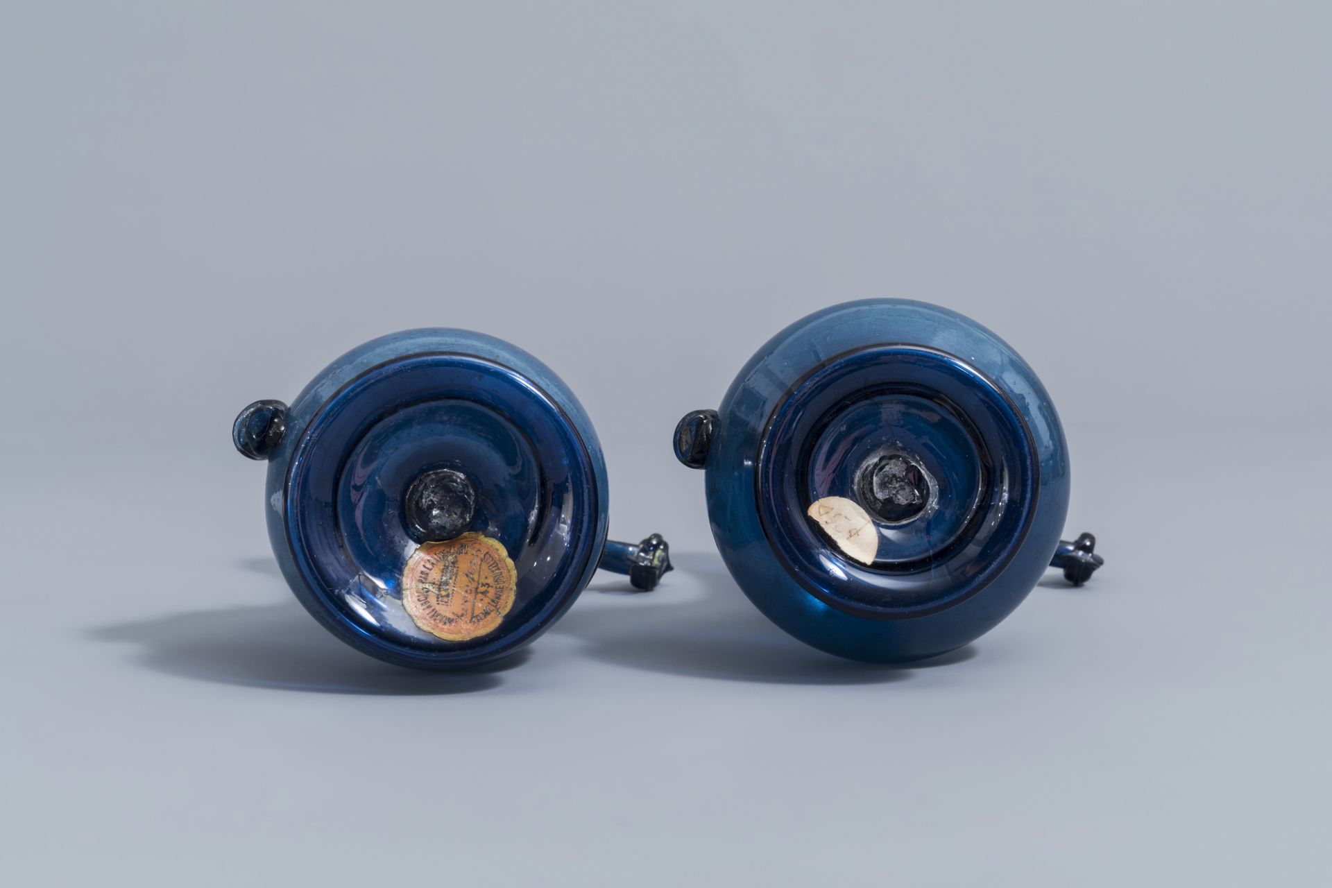 A pair of Islamic blue coloured relief decorated glass ewers or rosewater sprinklers, Qajar, Iran, 1 - Image 7 of 10