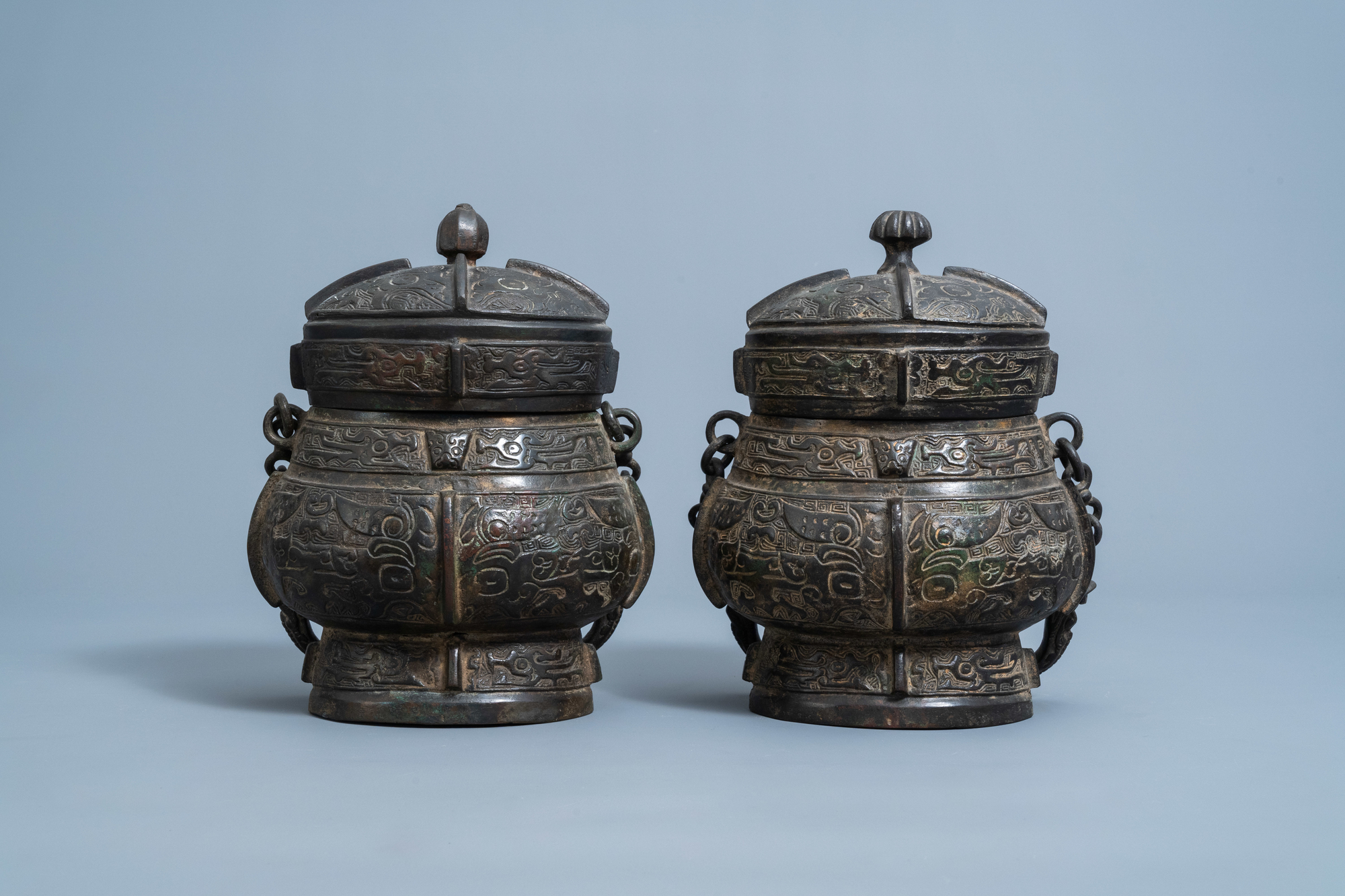 Two Chinese bronze ritual wine vessels, 'you', Ming