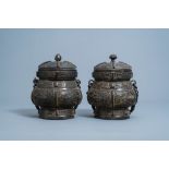 Two Chinese bronze ritual wine vessels, 'you', Ming