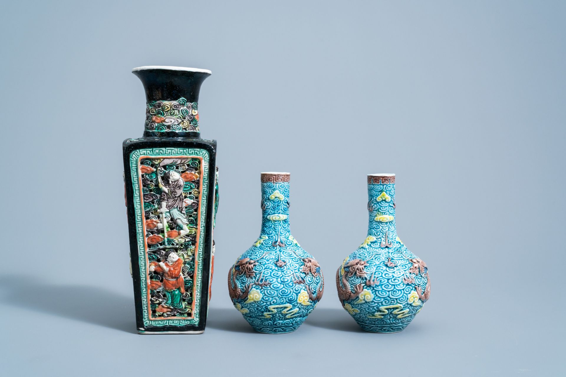 A pair of Chinese polychrome 'dragon' vases and a quadrangular 'Immortals' vase, 19th/20th C. - Image 3 of 7