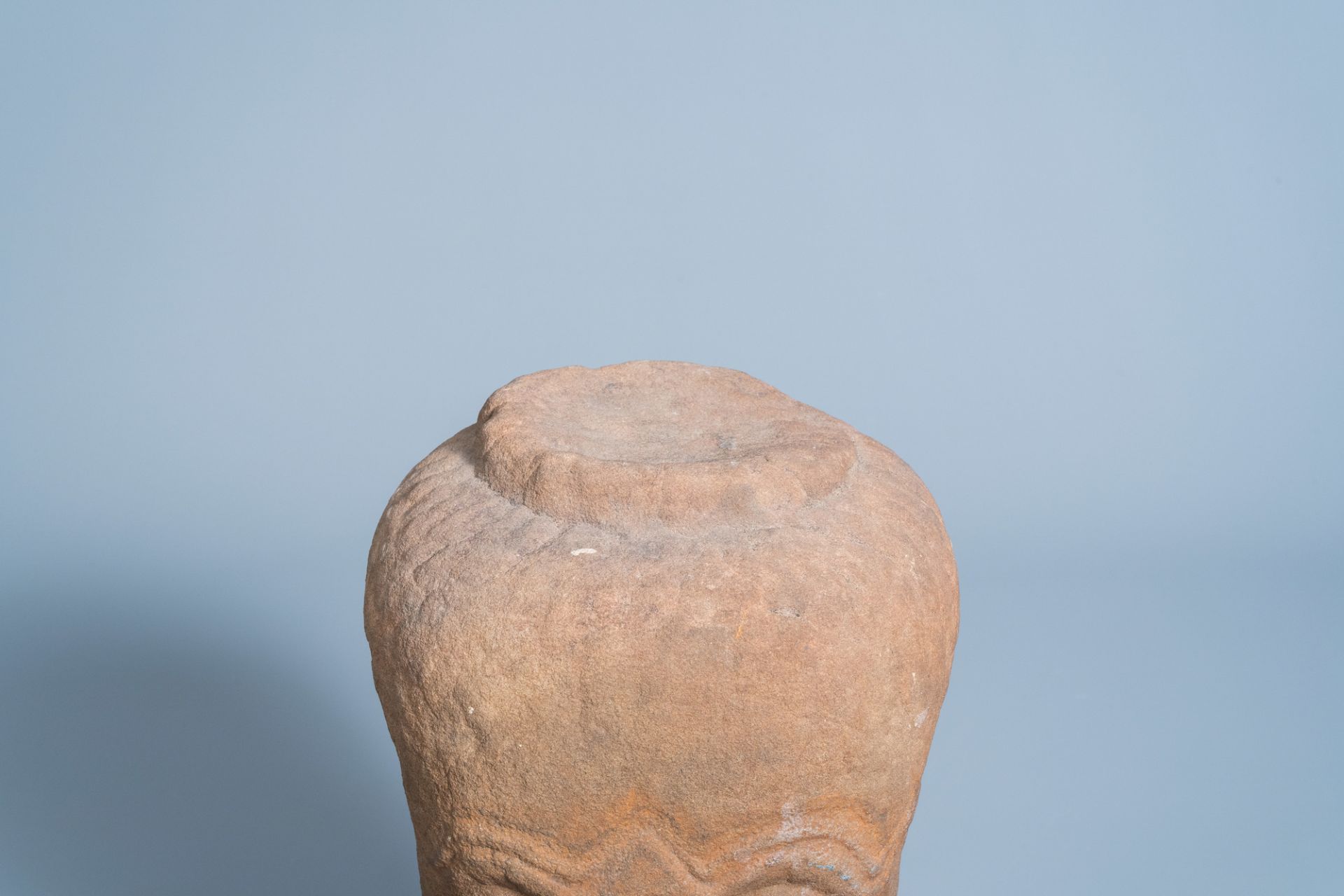 A Khmer sandstone head of a Dvarapala guardian figure, 11th C. or later - Image 5 of 5