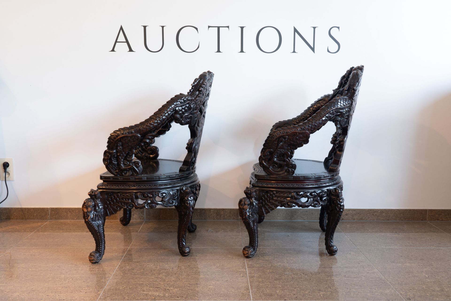 A pair of Chinese or Japanese carved wooden 'dragon' chairs, 19th/20th C. - Image 6 of 8