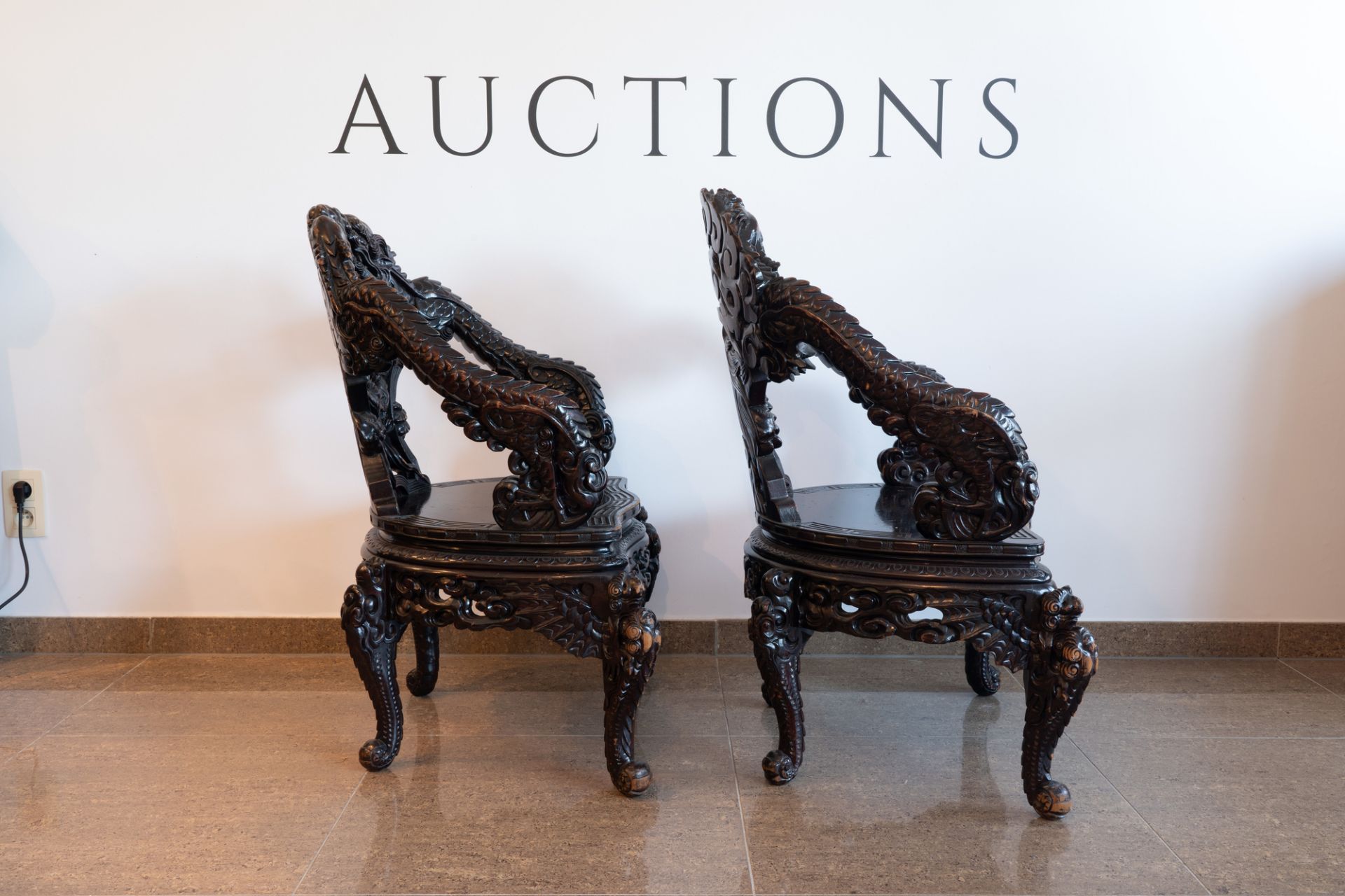 A pair of Chinese or Japanese carved wooden 'dragon' chairs, 19th/20th C. - Image 4 of 8