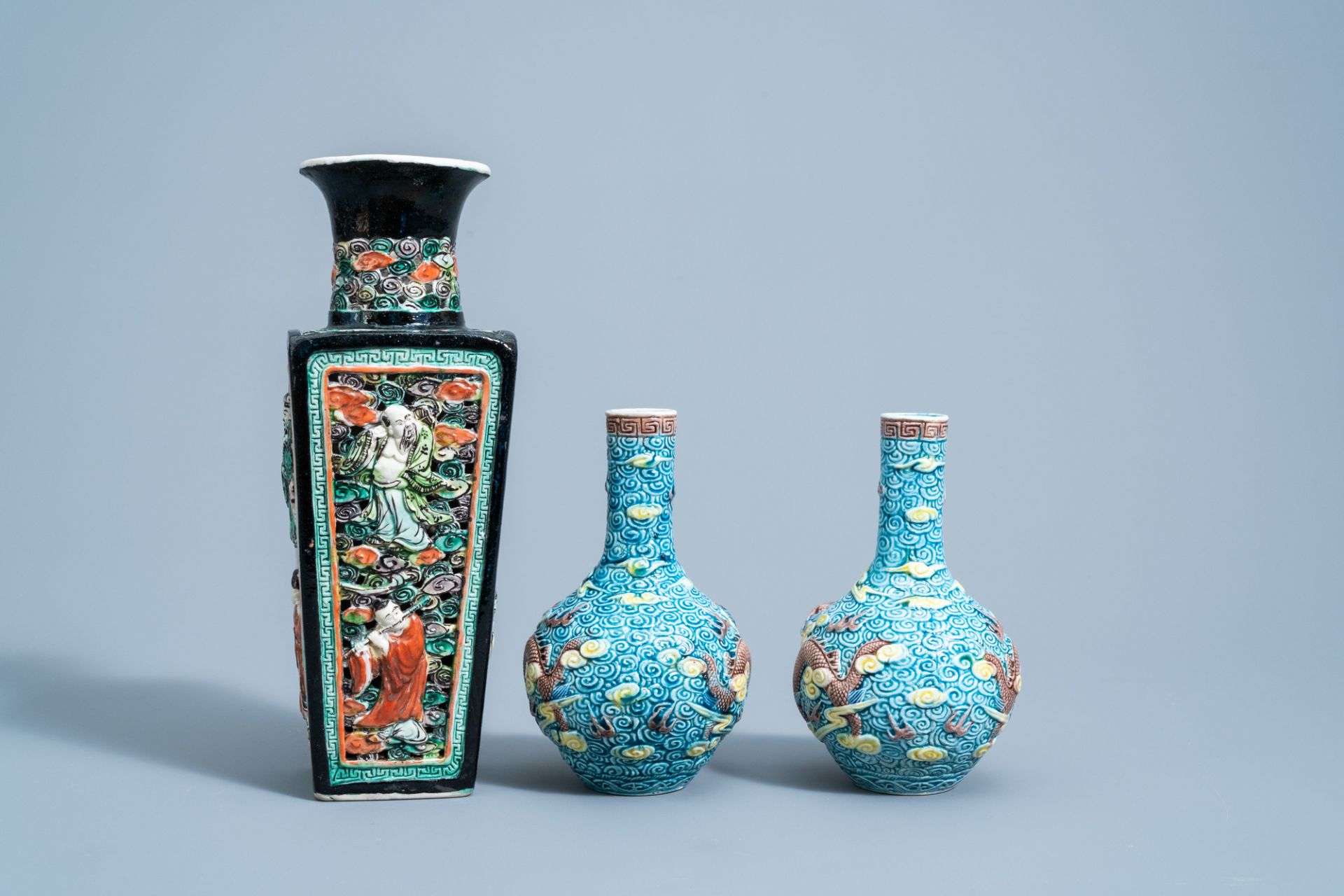 A pair of Chinese polychrome 'dragon' vases and a quadrangular 'Immortals' vase, 19th/20th C. - Image 5 of 7