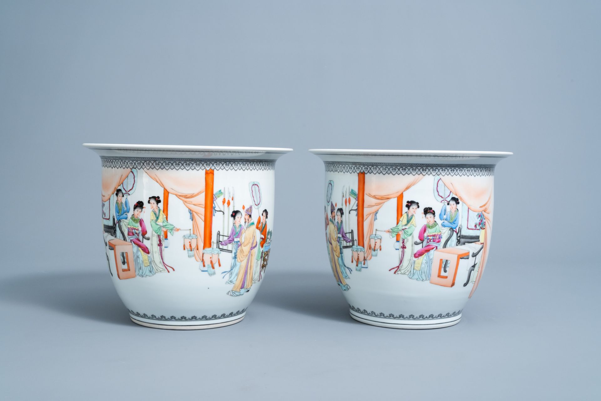 A pair of Chinese famille rose jardinieres with figures in an interior and a stand, Republic, 20th C - Image 2 of 7