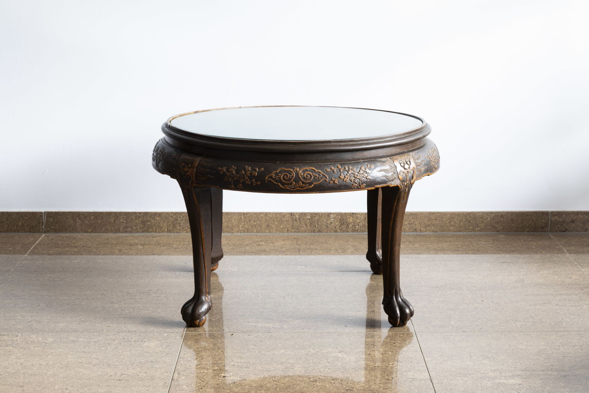 A Chinese wooden coffee table and four stools with relief design, 20th C. - Image 7 of 13