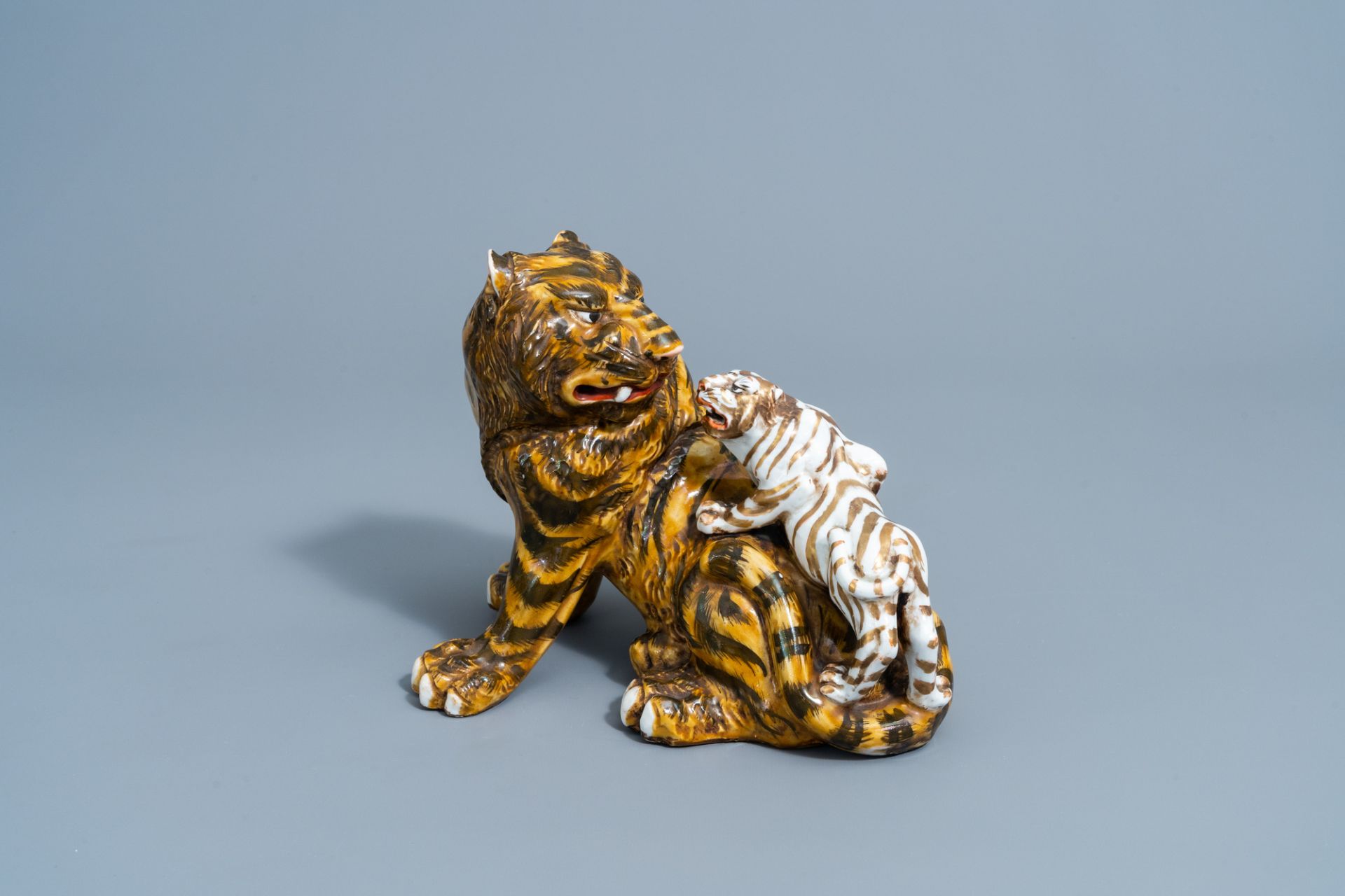 A Japanese group of two tigers with polychrome design, Meiji, 19th/20th C.