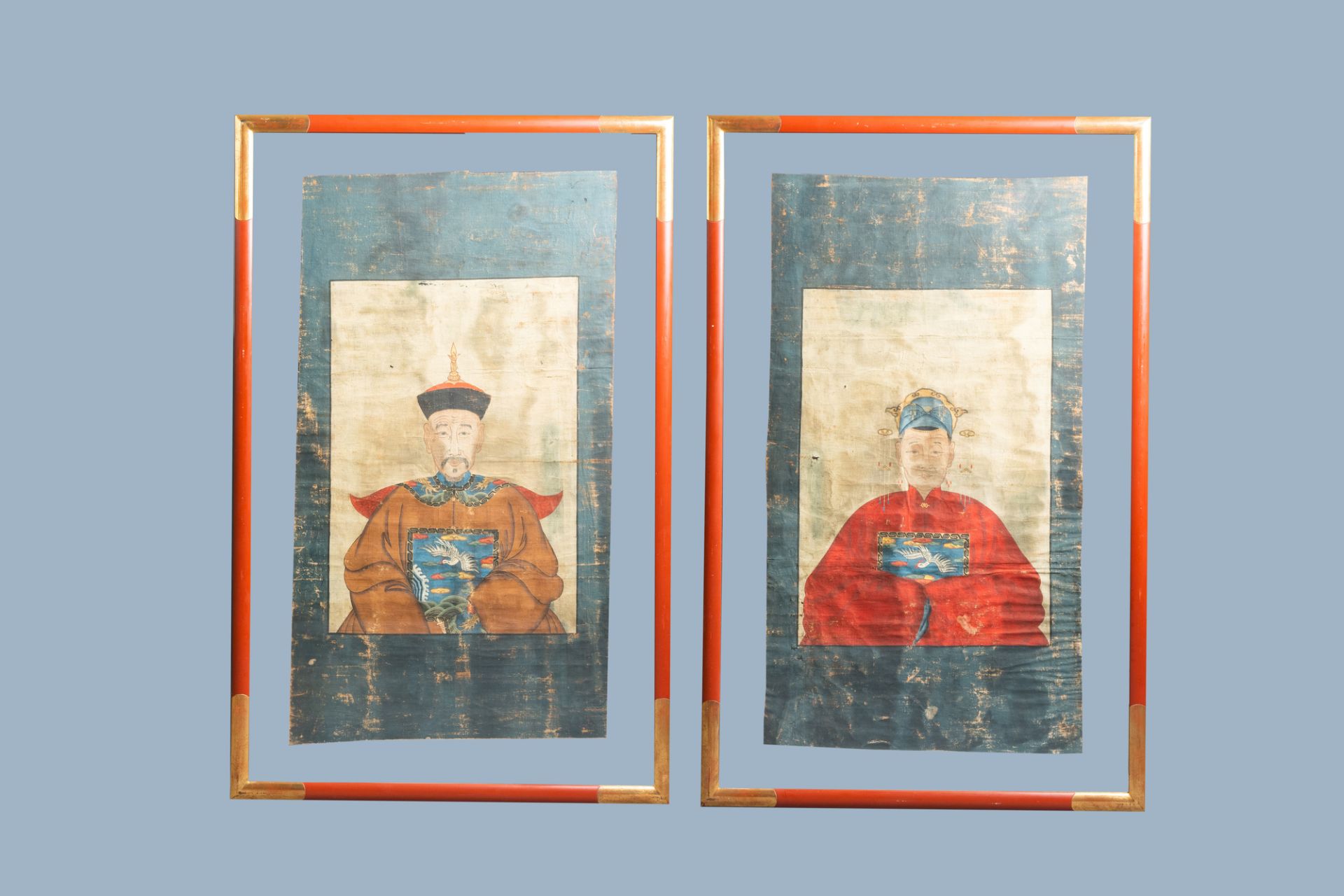 Chinese school, colours on canvas: 19th C.: A pair of portraits of a Mandarin official and his wife