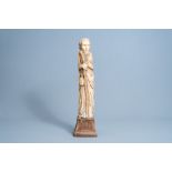 A French Gothic revival carved ivory figure of Saint James of Compostella on an oak wooden base, pro