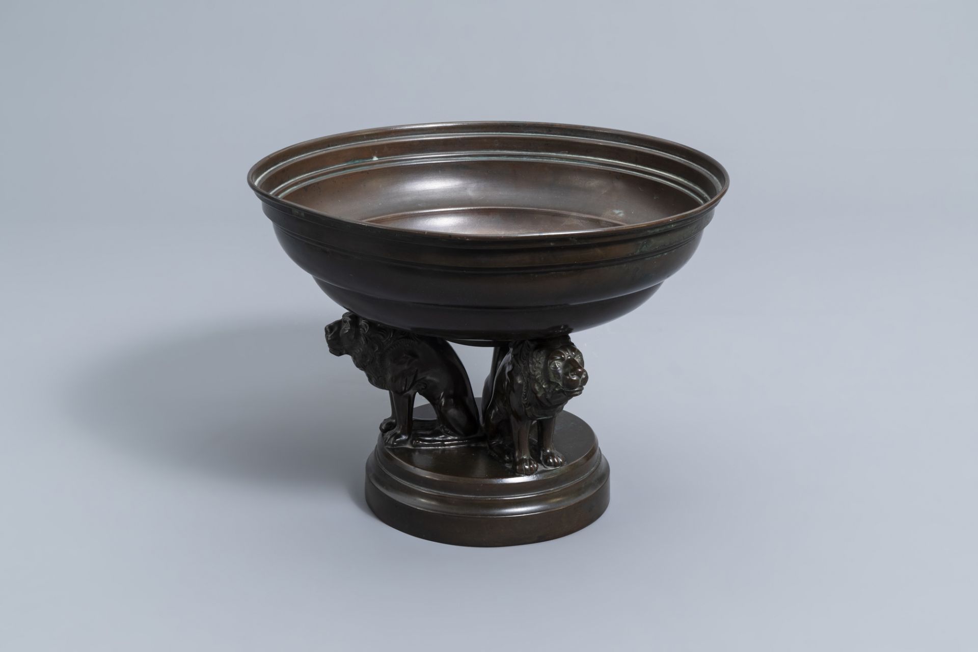 A French bronze and copper bowl resting on three lions, 19th/20th C