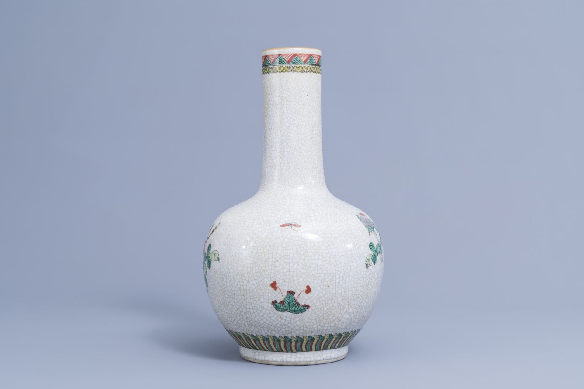 A Chinese bottle shaped Nanking crackle famille verte vase and two warrior jars, 19th/20th C. - Image 12 of 15