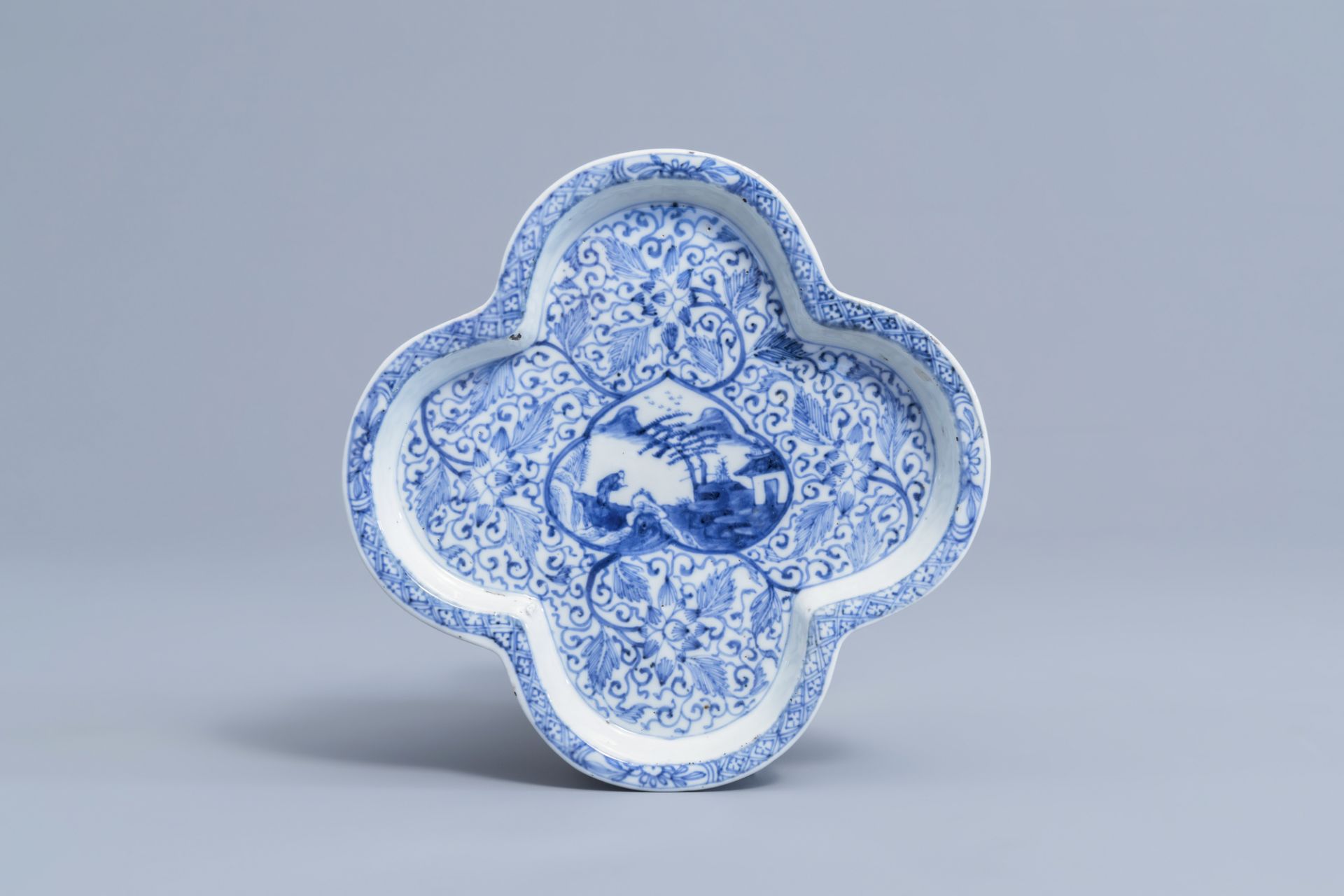 A pair of Chinese blue and white stem cups with floral design and a four-lobed teapot stand, Kangxi - Image 2 of 9