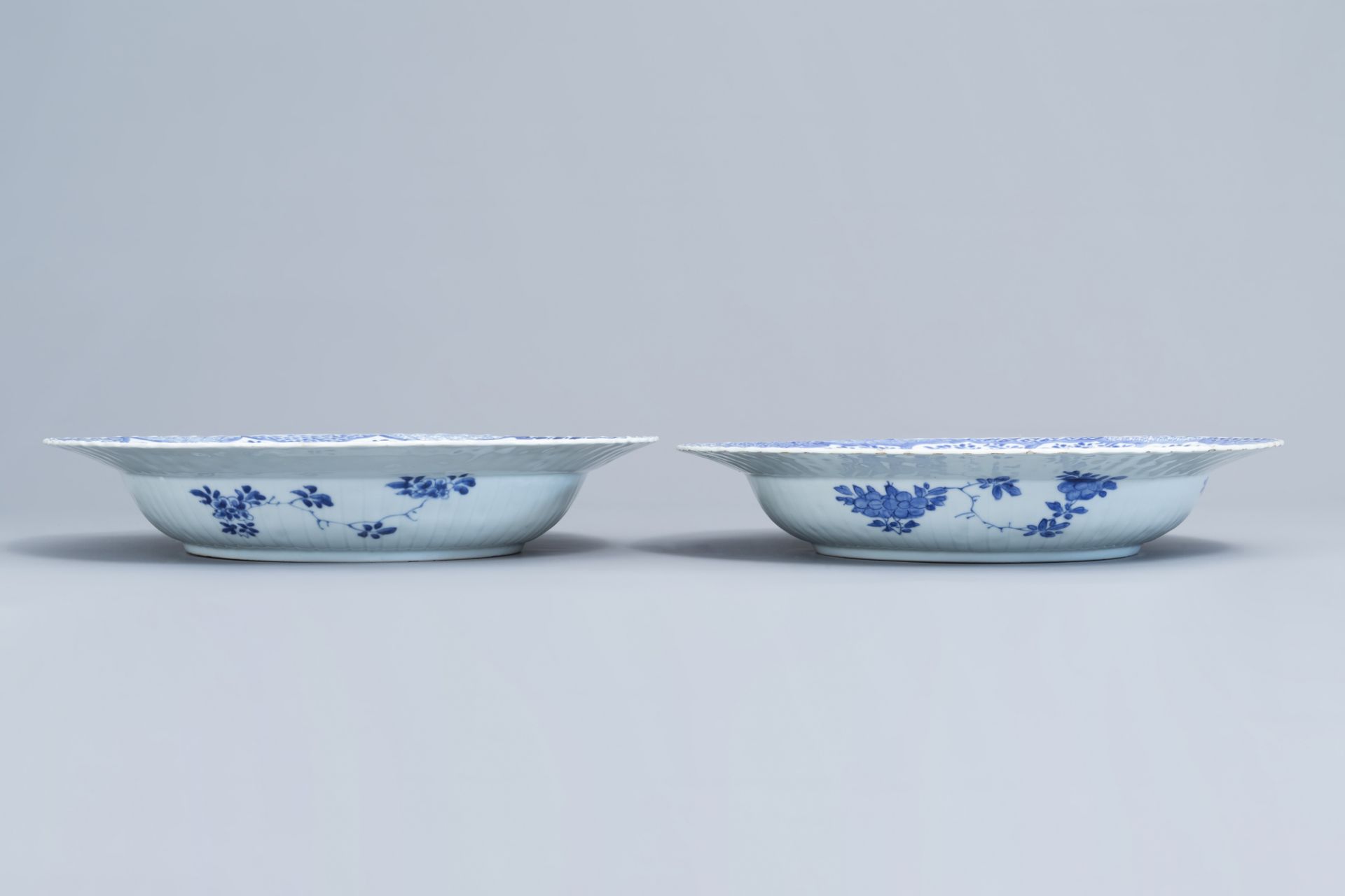 A pair of Chinese blue and white 'pheasant' chargers, Kangxi - Image 7 of 8