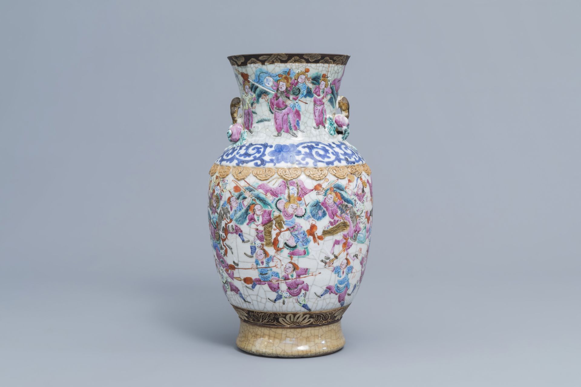 A Chinese Nanking crackle glazed famille rose 'warrior' vase, 19th C.