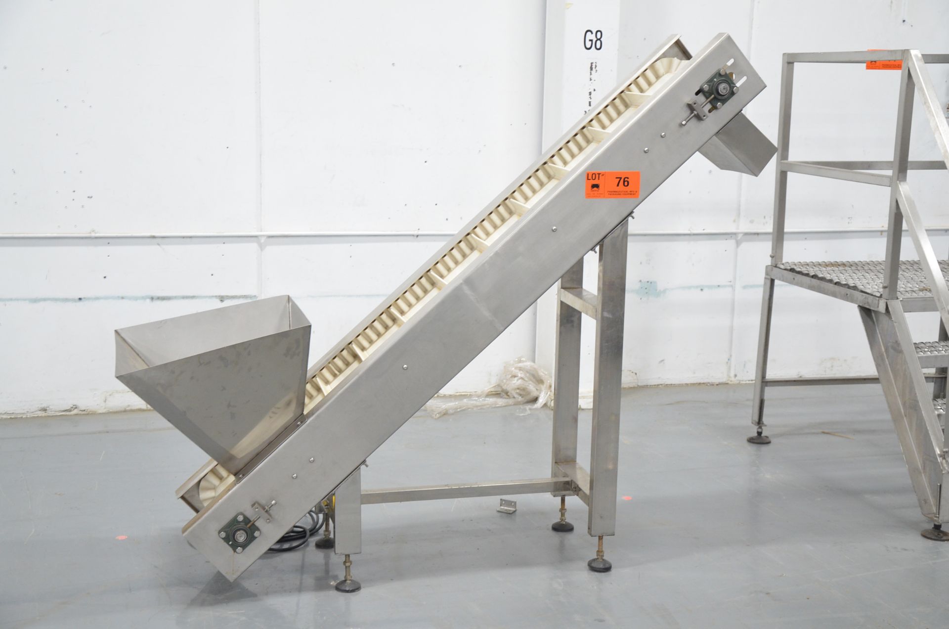 ABBKA 78"X17" POWERED FOOD GRADE INCLINE CLEATED BELT CONVEYOR WITH APPROX. 22"X24" HOPPER, (250-