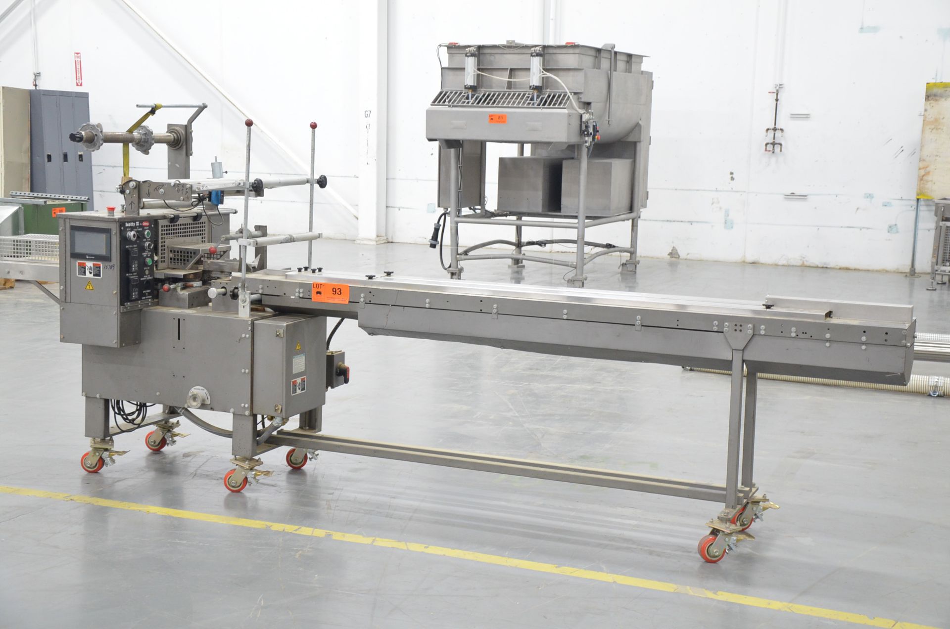 DOBOY SCOTTY II HORIZONTAL FLOW WRAPPER WITH 20-60 PACKAGES PER MINUTE CAPACITY, WEINVIEW RETROFIT