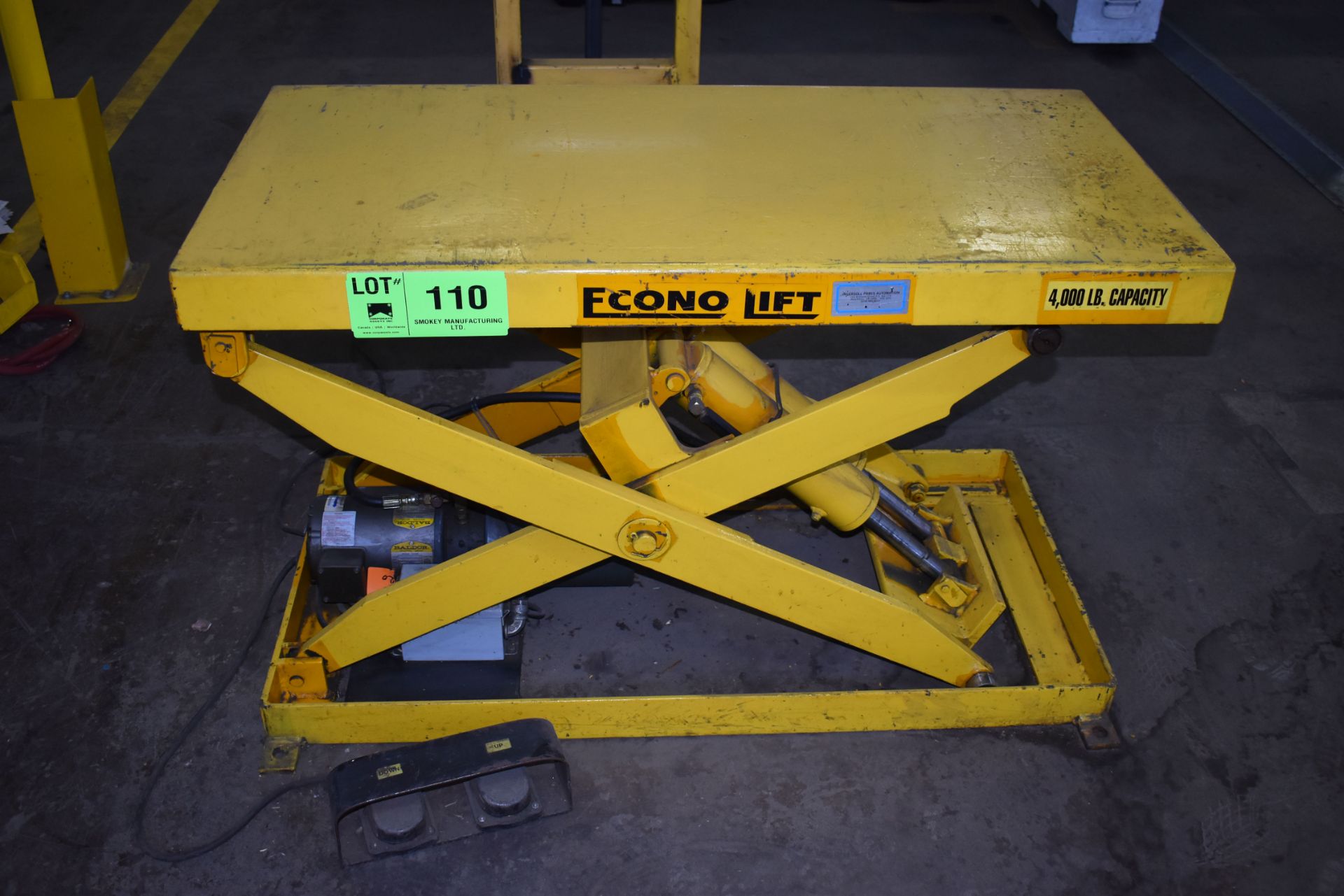 ECONOLIFT 4000 LB. CAPACITY HYDRAULIC SCISSOR LIFT TABLE (CI) [RIGGING FEES FOR LOT #110 - $50 USD