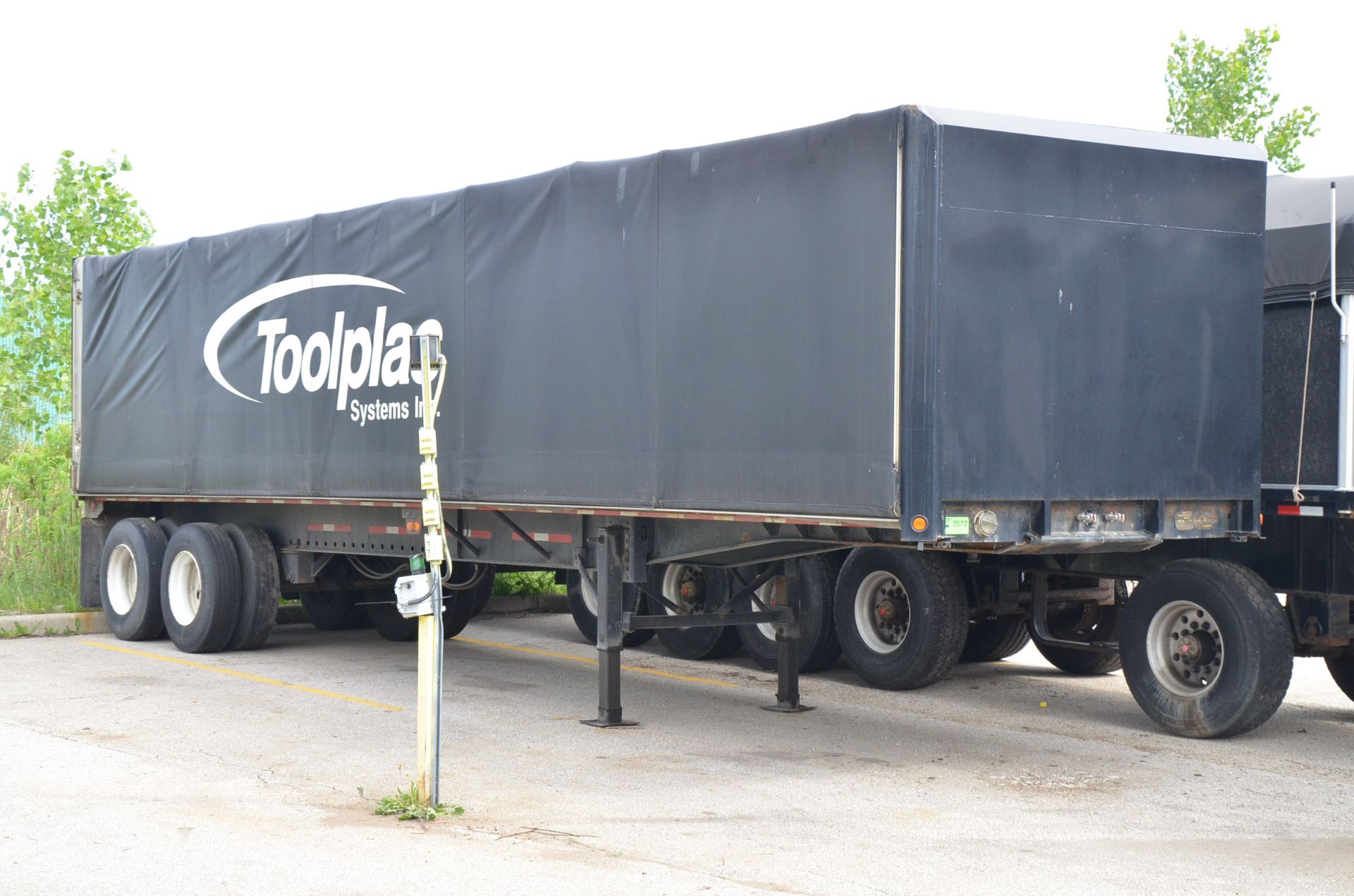 TRAILERMOBILE F71T-6RAG TANDEM AXLE 45' FLAT BED TRAILER WITH ROLLING TARP, VIN: 1PTF7ATAXR9014778