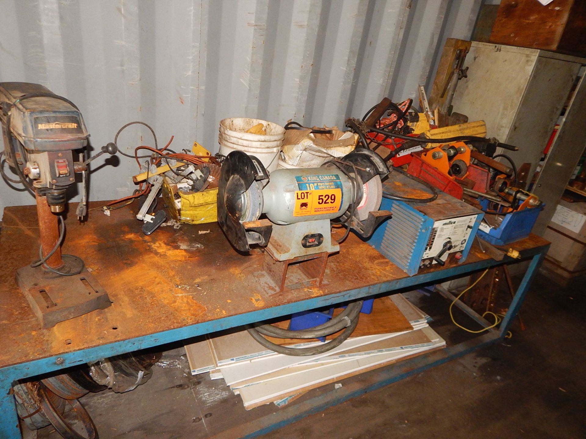 LOT/ WORK BENCH WITH CONTENTS - DRILL PRESS, DOUBLE END GRINDER, WELDING ACCESSORIES, HOIST