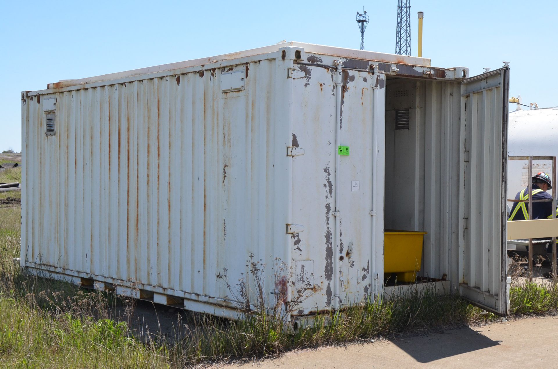 20' STORAGE SEA CONTAINER [RIGGING FEE FOR LOT #35 - $250 USD PLUS APPLICABLE TAXES]