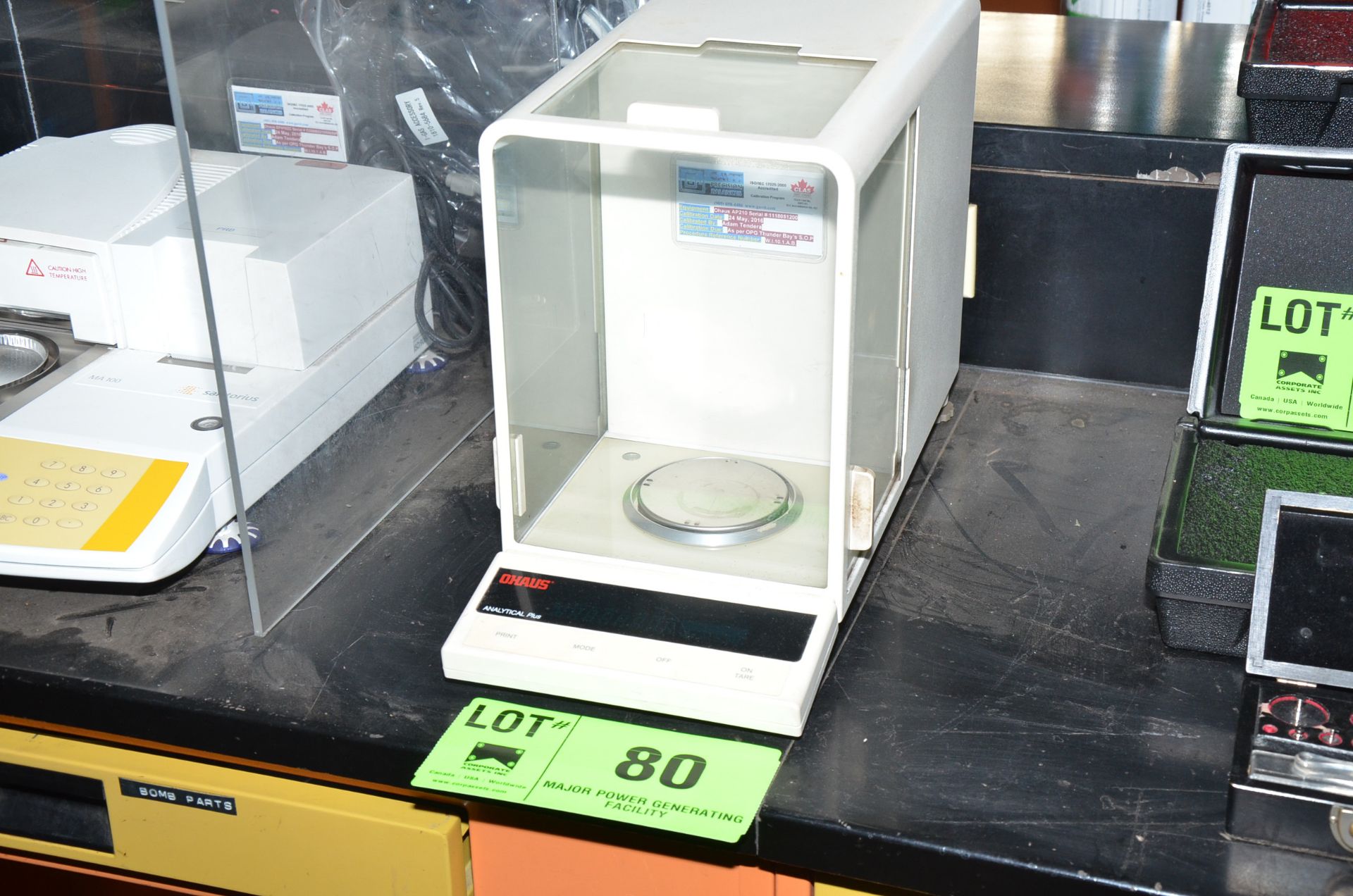 OHAUS ANALYTICAL BALANCE SCALE WITH DRAFT SHIELD, S/N N/A [RIGGING FEE FOR LOT #80 - $25 USD PLUS