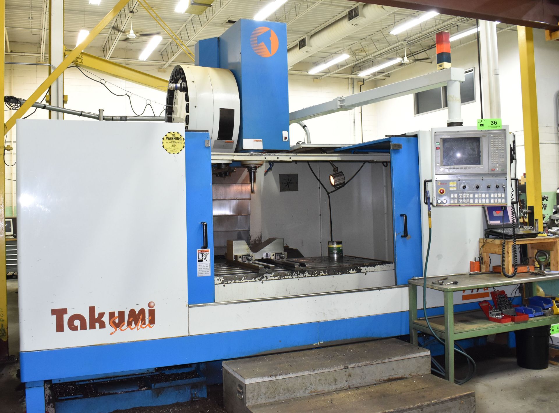 TAKUMI SEIKI (2000) V17A CNC VERTICAL MACHINING CENTER WITH TRAVELS X- 66.9", Y- 33.5", Z- 29.6",