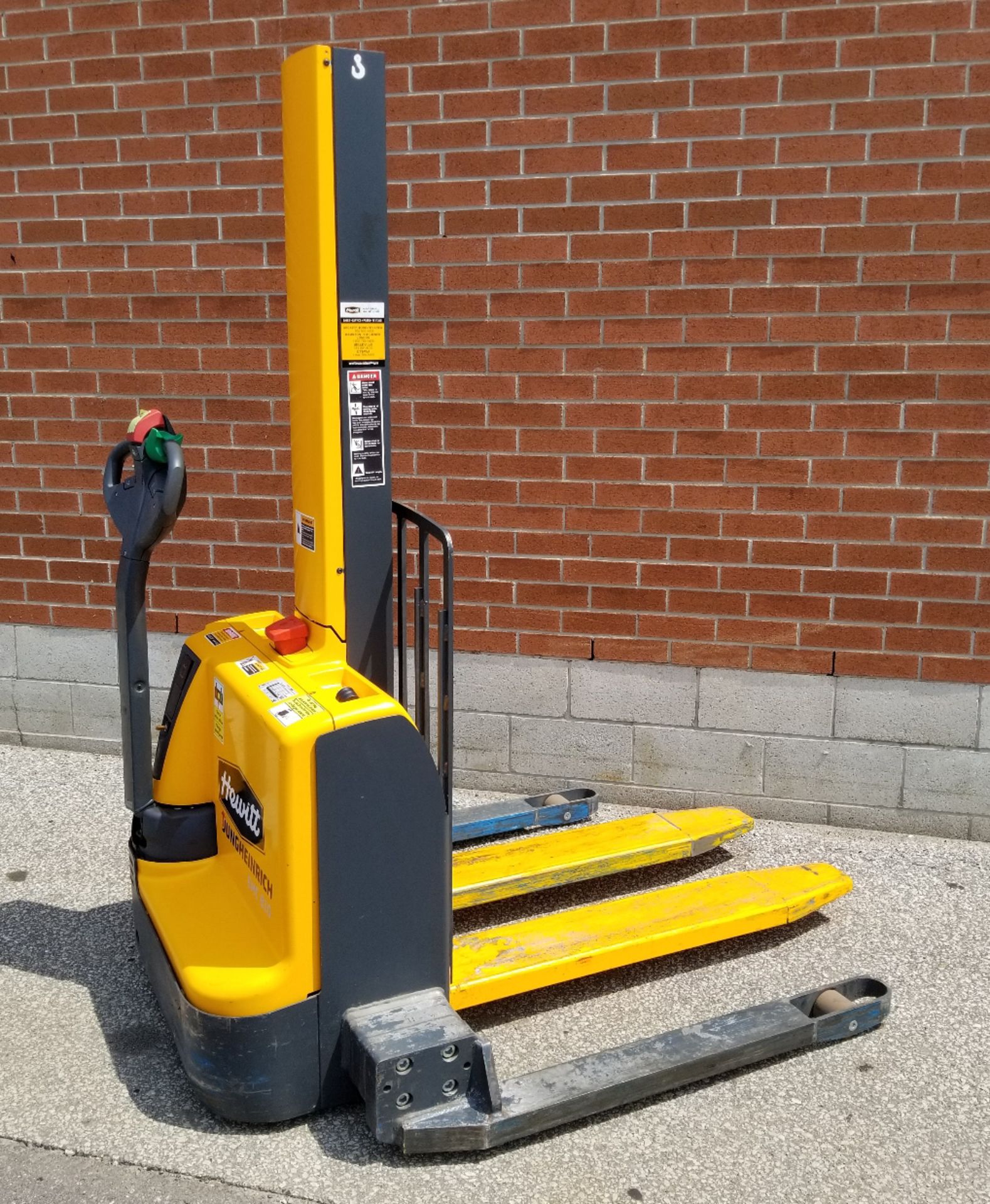 JUNGHEINRICH EMC B10 24V ELECTRIC WALK-BEHIND PALLET STACKER WITH 2200 LB. CAPACITY, 64" MAX. LIFT