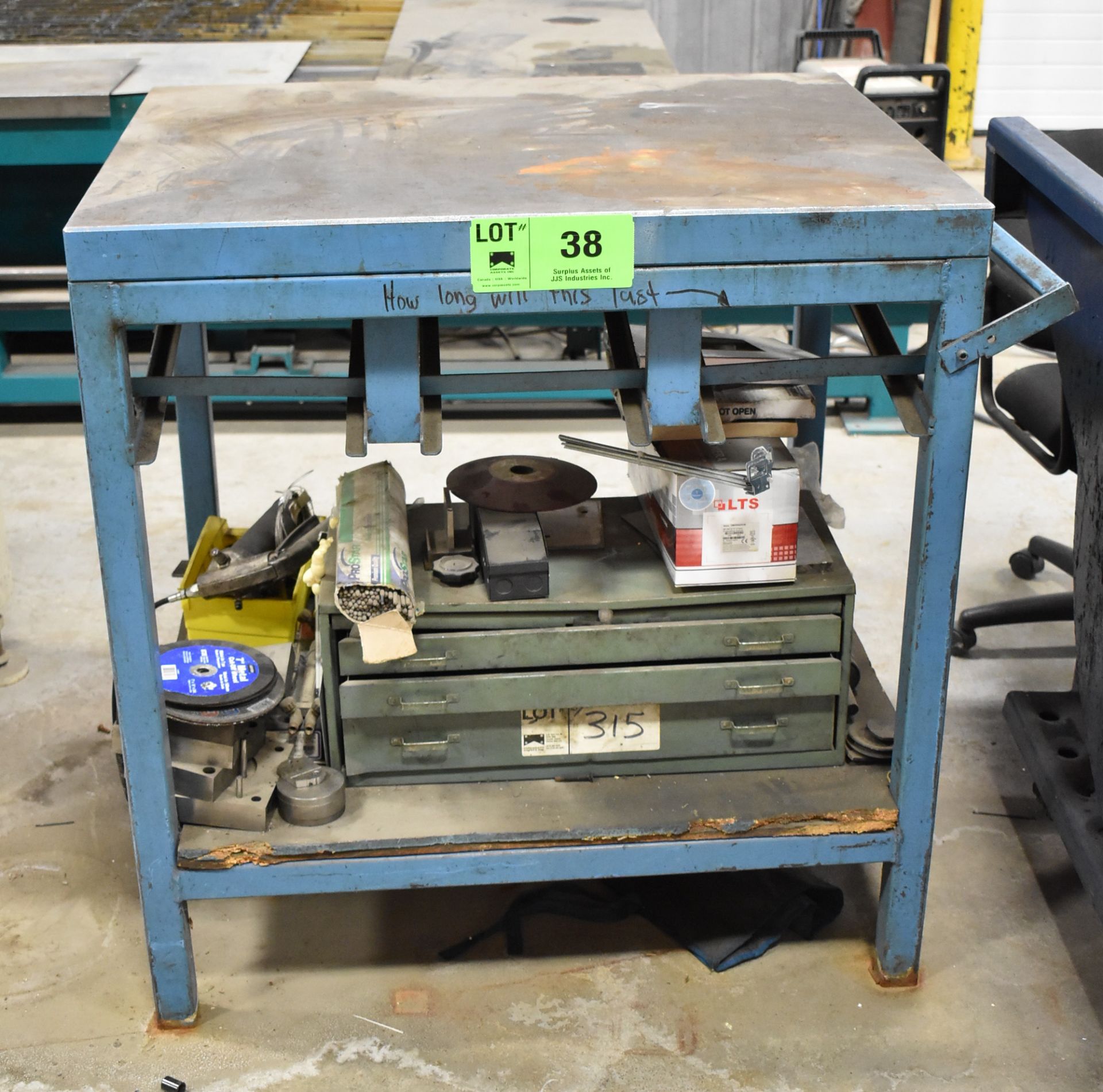 LOT/ STEEL WORKBENCH WITH CONTENTS CONSISTING OF ABRASIVE AND WELDING SUPPLIES