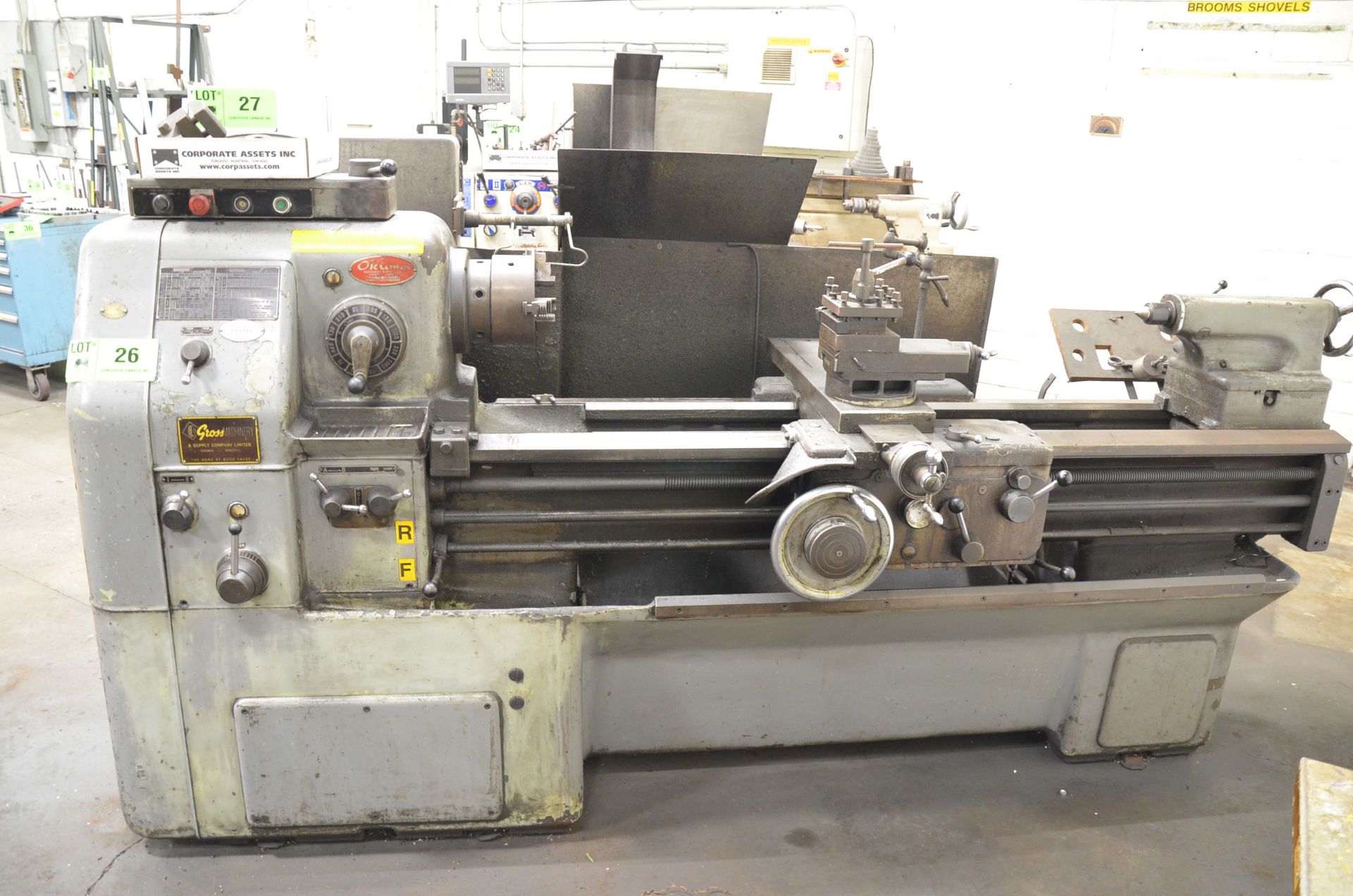 OKUMA LS ENGINE LATHE WITH 24" SWING, 60" BETWEEN CENTERS, 1.5" SPINDLE BORE, 8" 3-JAW CHUCK, SPEEDS