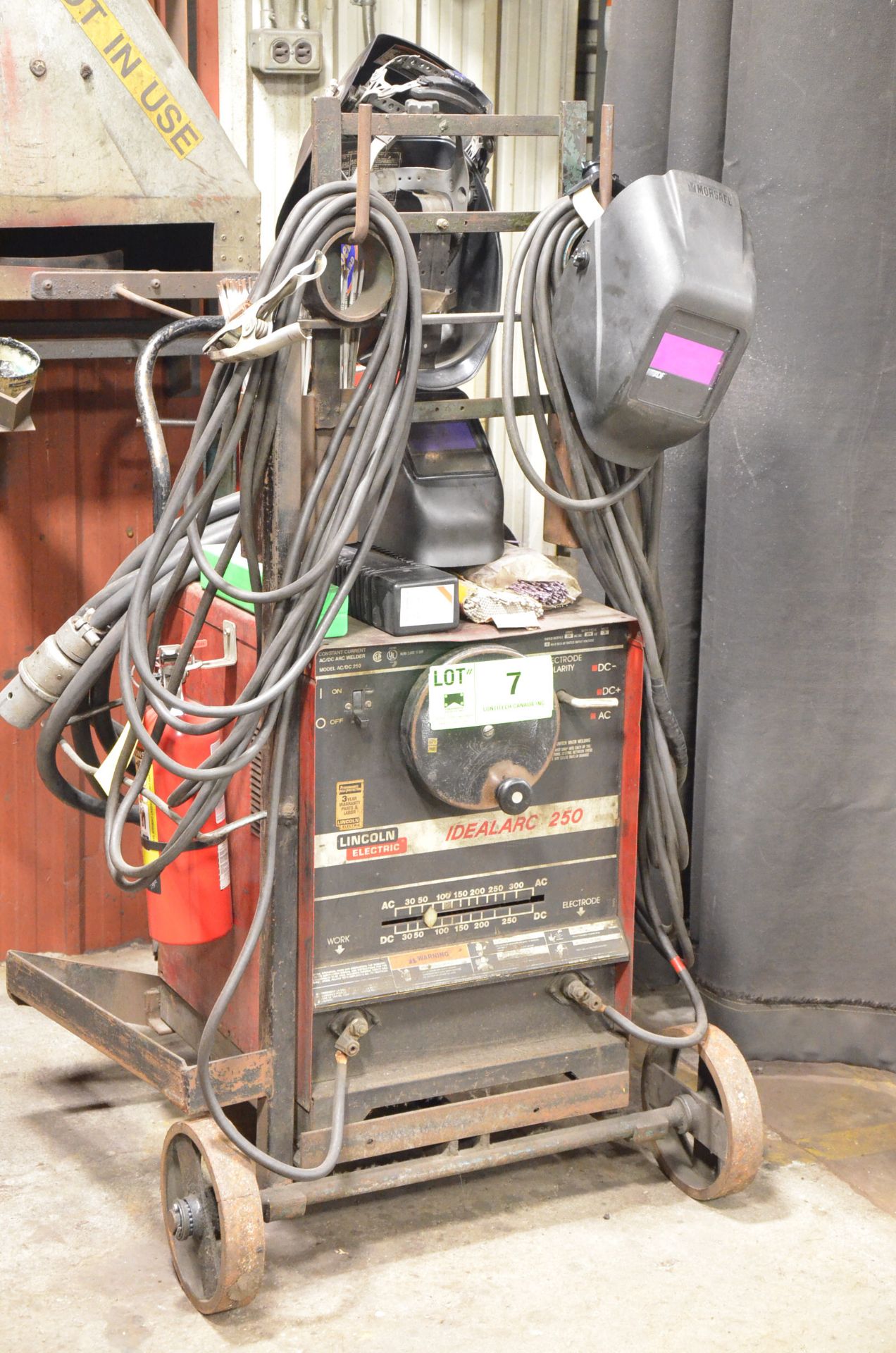LINCOLN ELECTRIC IDEALARC 250 PORTABLE ARC WELDER WITH CABLES, GUN, AND WELDING SUPPLIES, S/N N/A [
