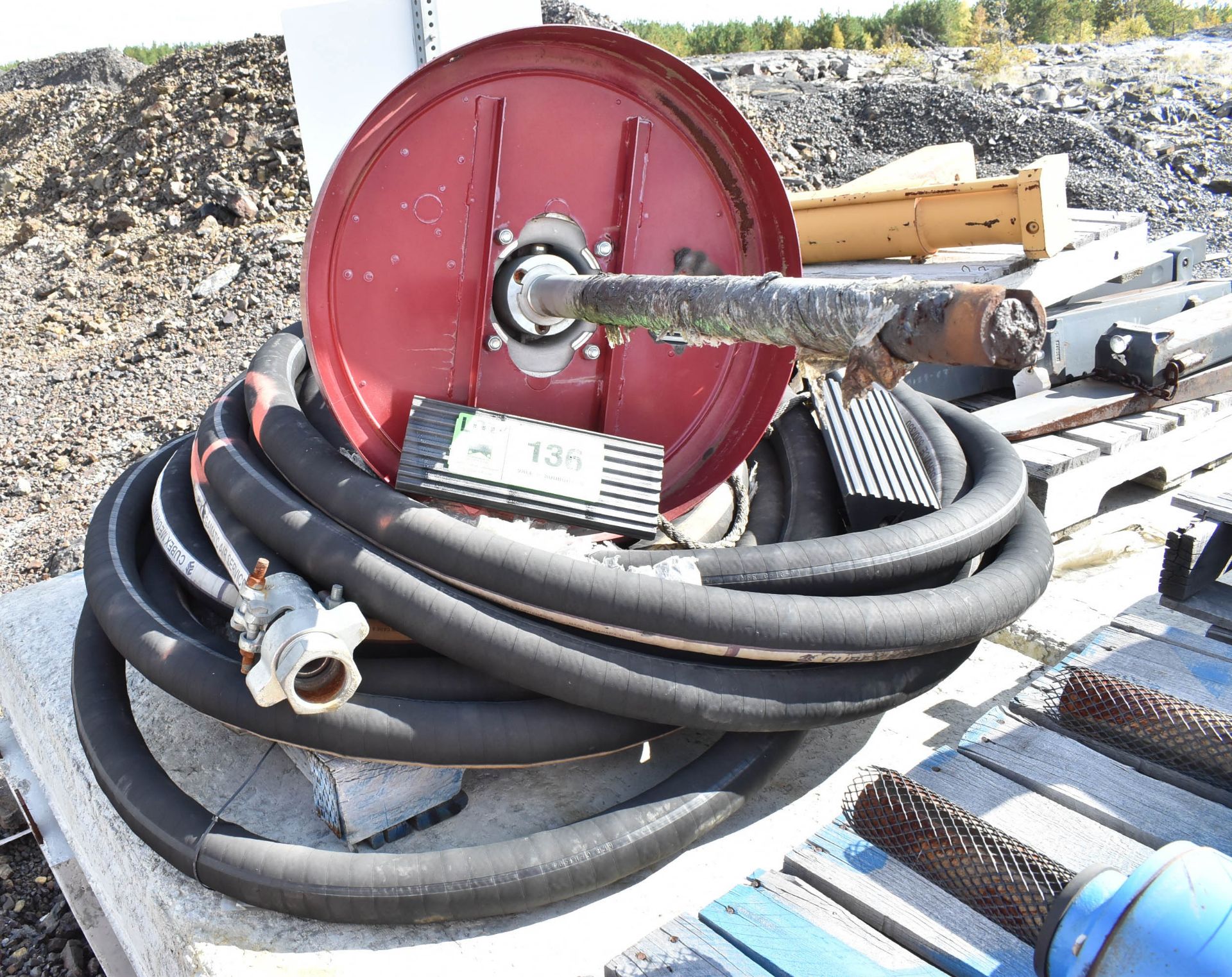 LOT/ SKID WITH 2" HOSE, BARREL PUMP & SPARE TIRE (CMD YARD #2)