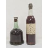 One bottle Chateau du Cariquet Armagnac XO and another bottle, the capsule marked Cognac, E