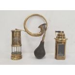 Welsh brass Davey-type miner's lamp, another brass and glass lamp and a brass carved horn (3)