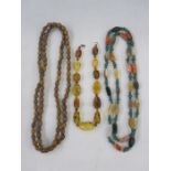Agate and green stone necklace, amber-type necklace and another (3)  Condition ReportPlease see