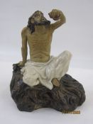 Chinese porcelain and partly glazed model of a seated mudman (Li Tieguai), one of the eight