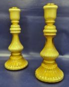 Pair Villeroy & Boch gold iridescent glass candlesticks each with fluted sconce knopped and fluted