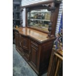 19th century mahogany mirror-back sideboard, the bowed front with assorted cupboard doors and single