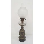 Victorian brass and glass lamp having cut glass well, satin shade and chimney