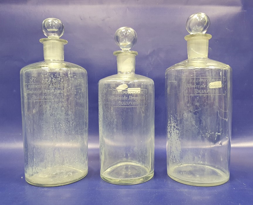 Three glass apothecary bottles, a cut decanter, vase, water jug and other items (11)