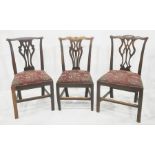 Three Chippendale-style oak dining chairs with pierced vase-shaped backs (3)