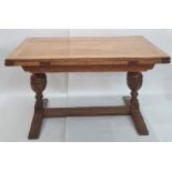 Early 20th century rectangular oak extending dining table with cleated end supports to the top,
