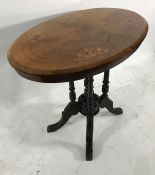 19th century walnut and inlaid oval top centre table on pedestal support in the form of four