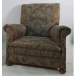 19th century armchair in foliate patterned upholstery, on turned front supports